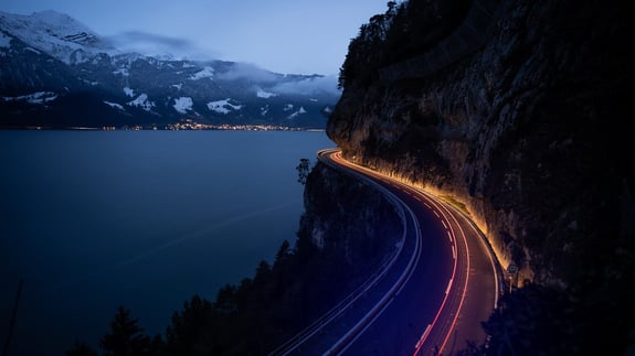 highway-in-the-mountains-at-night